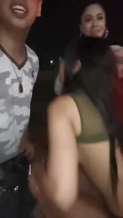 Two Sluts In Front of a Bar
