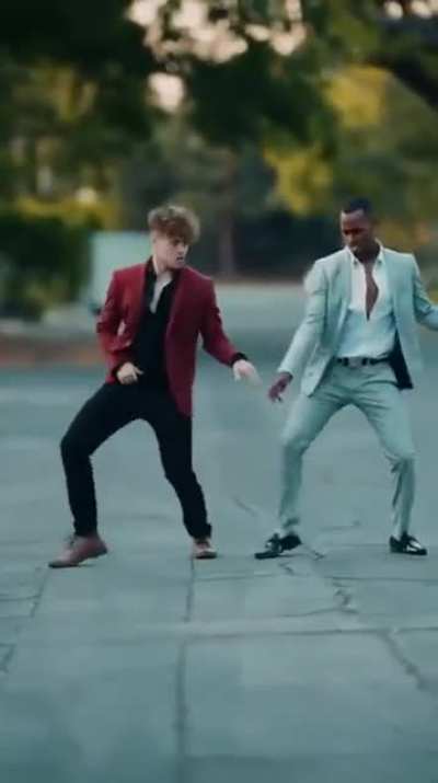 These two guys dancing to Stayin' Alive