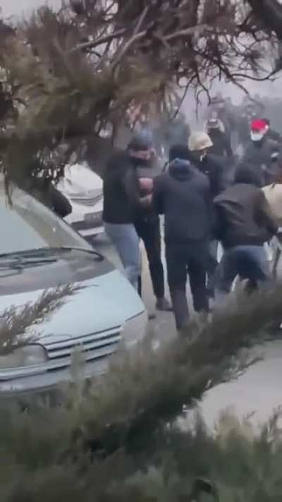 Rifles are being handed out to protesters on the streets of Kazakhstan's largest city, Almaty