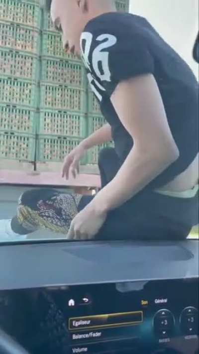 Stealing tangerine from a moving truck!