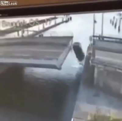 Car doesn't wait for bridge.