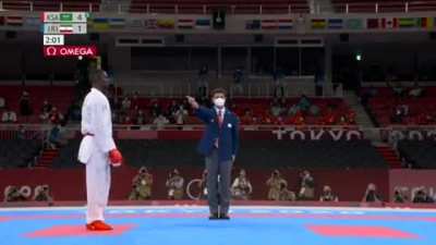 Athlete on the verge of country's first gold medal disqualified for a kick 