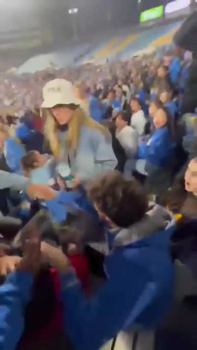UCLA girl smacks a guy in the middle of UCLA-USC football game