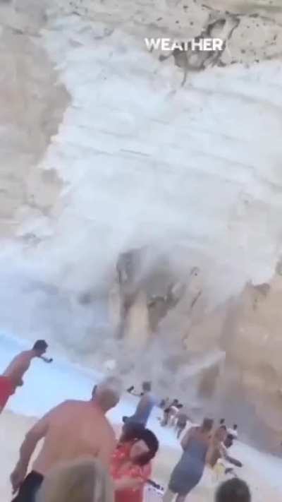 Remind me to never go to a beach with a cliff made out of sand
