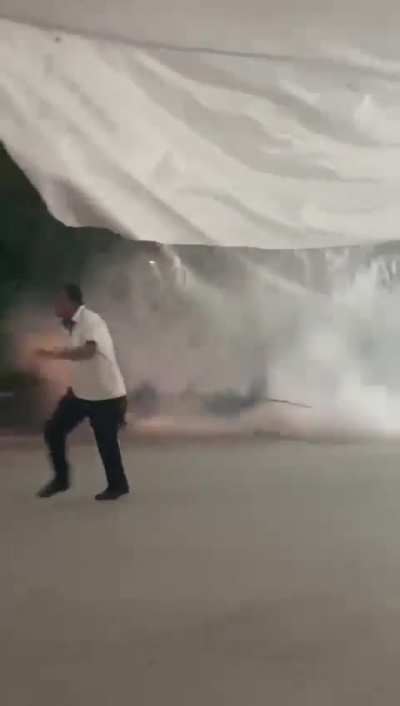 Guy at Brazilian bus terminal pops a giant water pimple 
