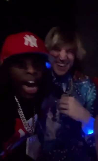 X and Kai at party