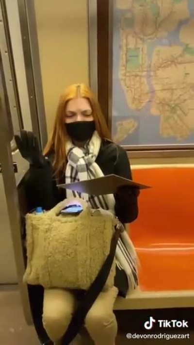 Painting a stranger on the subway results in surprise followed by tears of happiness