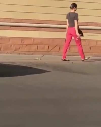 Woman takes a banana for a walk