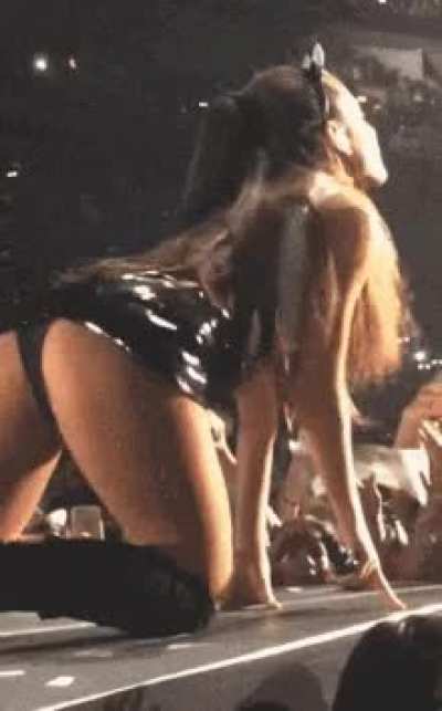 On her knees