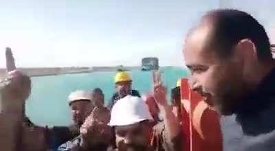 Egyptian crew of tug boat named Mashour celebrate after freeing of Ever Given by chanting 