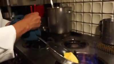 This is called omurice and a very hard omlet to make