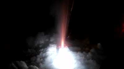 My homemade sugar rocket motor with a concrete nozzle. Any advice for improvement, over/under expansion? Anything is great.