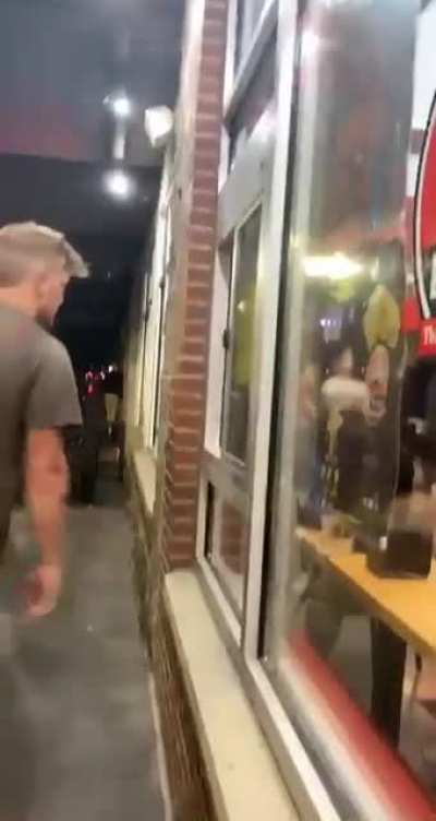 Employee punches drunk guy who is demanding food but never ordered any.