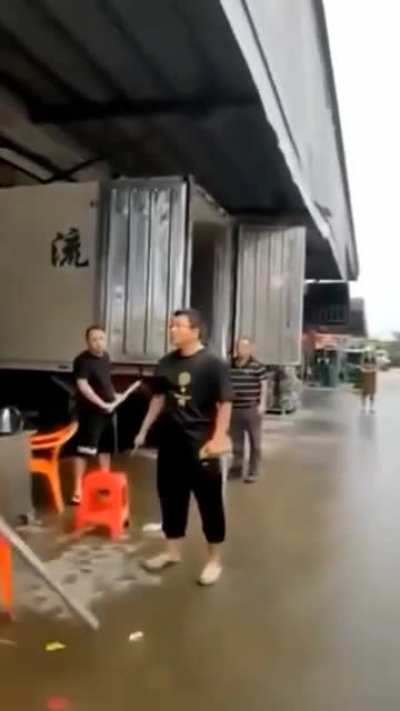 A guy threatening with a knife gets knocked down