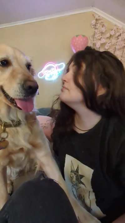 Trying to kiss the dog