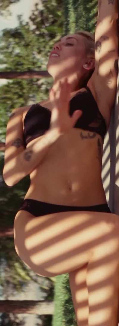 Miley Cyrus in a Black Bikini - New Single 'Flowers' - Music Video (2023)