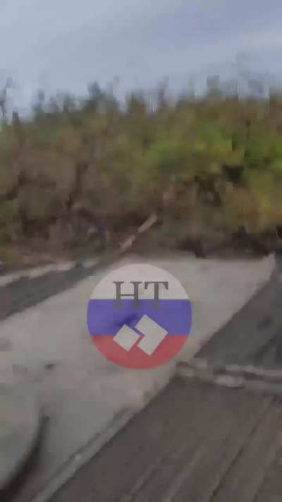Russian IFV driver films a Ukrainian ATGM barely missing them