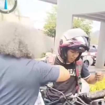 Angry hispanic Karl Marx yells at security guards for denying a delivery driver entry to a private urbanization.