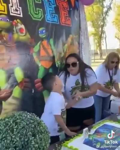 Bratty kid destroys birthday cake