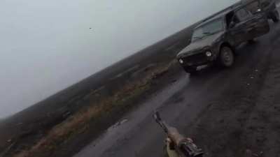RU POV: GoPro Footage: Stormtrooper destroyed attacking FPV drone that was hovering around his vehicle with rifle fire.