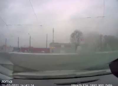 Car in Kharkiv today narrowly avoiding a Grad MLRS barrage.