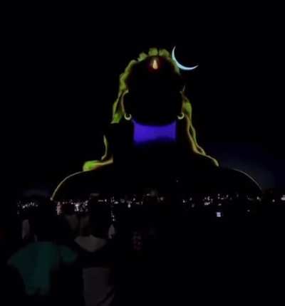 Giant statue of Shiva, known as the Adiyogi, aka ‘the first yogi’, lighting up. Lightning in the background coincidentally reveals the scale of the statue.