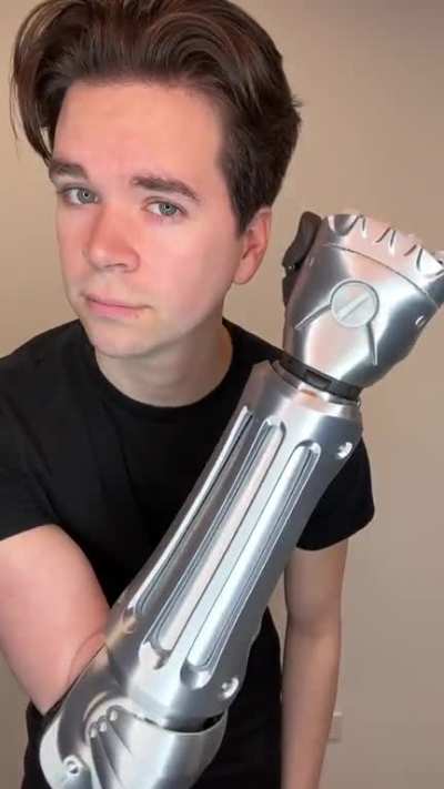I made Edward Elric's automail from Fullmetal Alchemist as a cover for my bionic arm