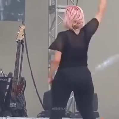 Rubbing her butt