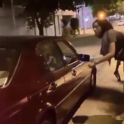 Antifa giving bricks to black people to throw
