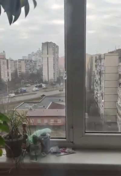 Russian vehicle rides over a car with a civilian in it.