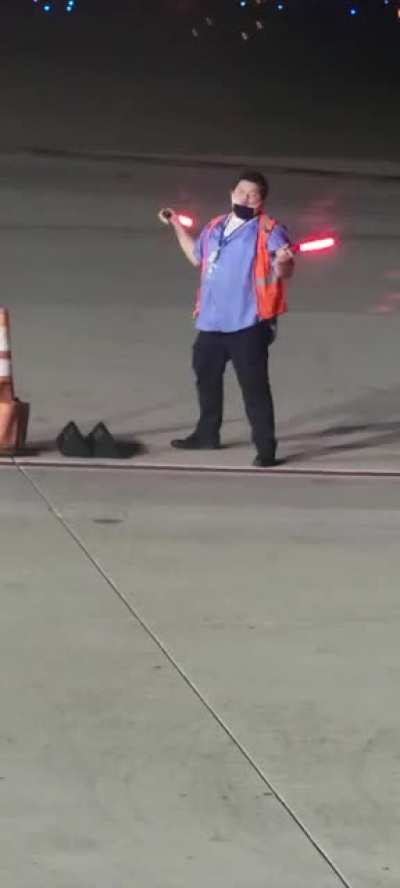 Caught a ramp agent at the airport doing a little dancing