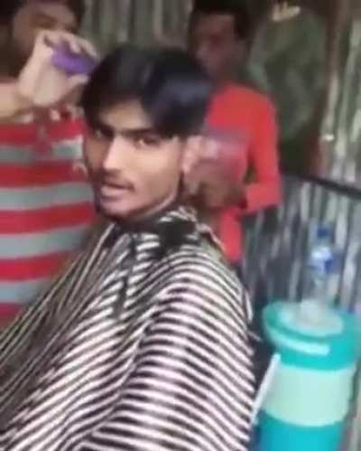 A guy getting a haircut