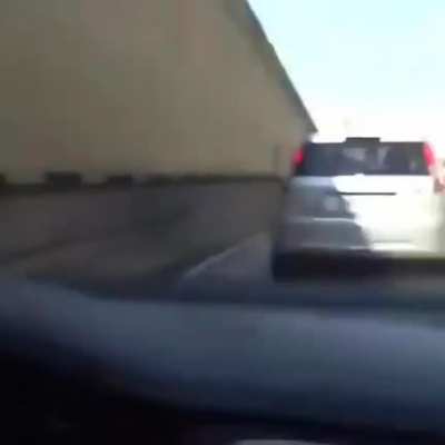 Idiot kicking a car