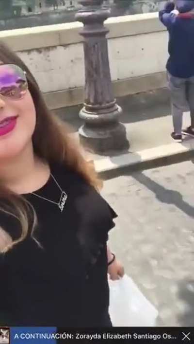 Girl taking selfie kissed by homeless man