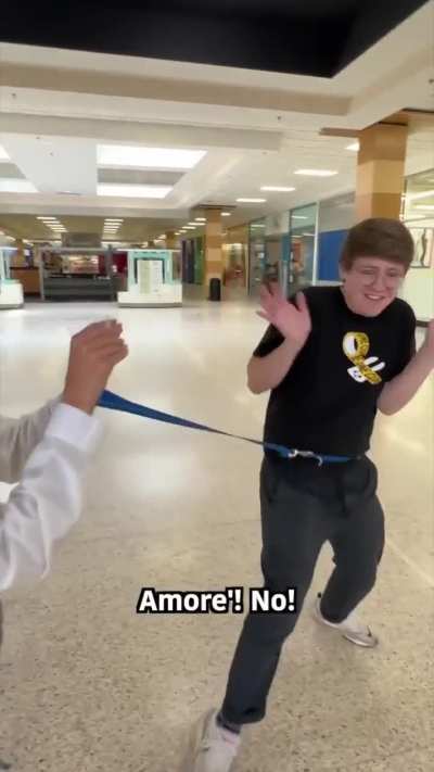 Surprising her Italian husband by breaking a spaghetti.