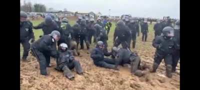 The mud, the monk and the cops