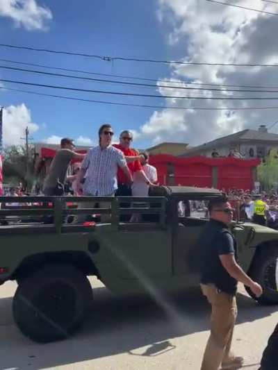 Someone throwing a beer can at Ted Cruz at the Astros championship parade in Houston today