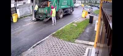 Garbage truck almost kills a worker