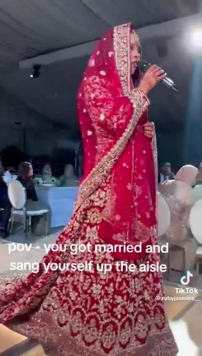 bride sings for her own entrance