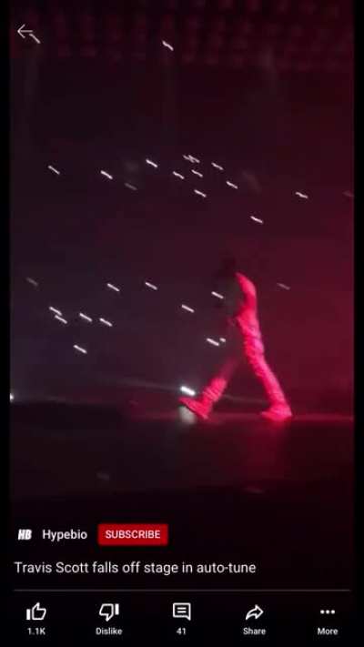 Travis Scott falling off the stage with auto tune