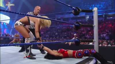 Michelle's prediction comes true: she humiliates Melina and takes her title