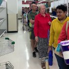 Handing out toilet paper at Coles in an orderly fashion.