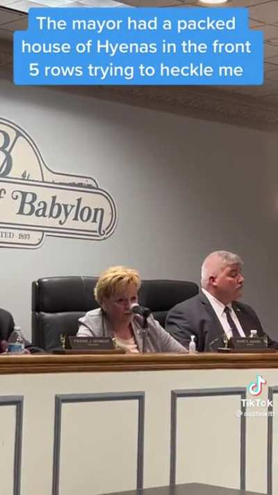 mayor of babylon REFUSES to answer questions regarding their corruption . has a group of laughing lackeys up front to discourage speakers. corruption starts at the local level