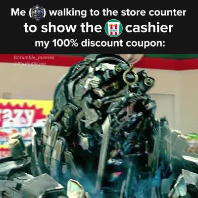 Me showing the cashier my 100% discount coupon: