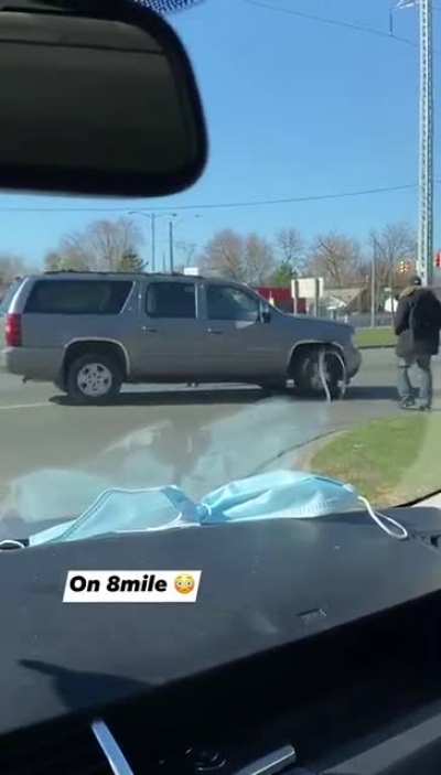 Idiot <out of> car (Stuck in reverse on 8 Mile Rd in Detroit, MI, USA)