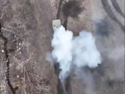 UA pov: Russian BMP-1 is being hit by drone dropped munition while troops are falling out of the back.