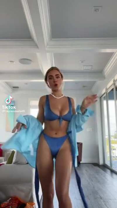 Jiggly blonde bends over