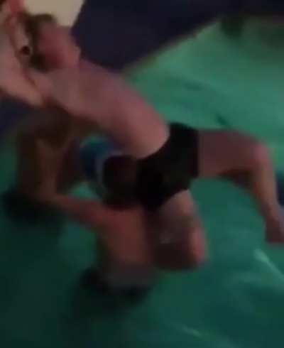 Idiot tries to dunk himself, gets stuck in an uncomfortable position instead