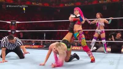 The Kabuki Warriors beating on Alexa Bliss
