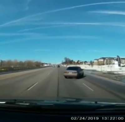This idiot passing at high speed through a puddle